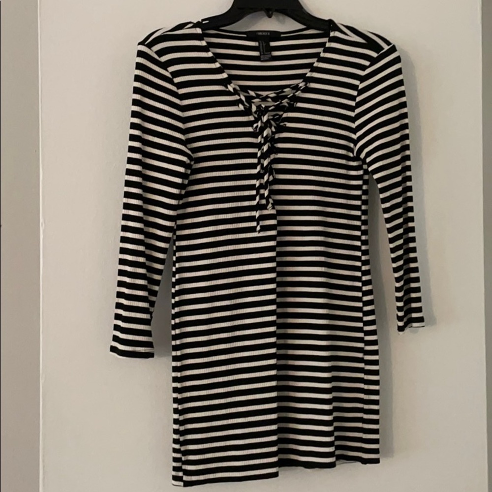 Striped top with criss cross detailing